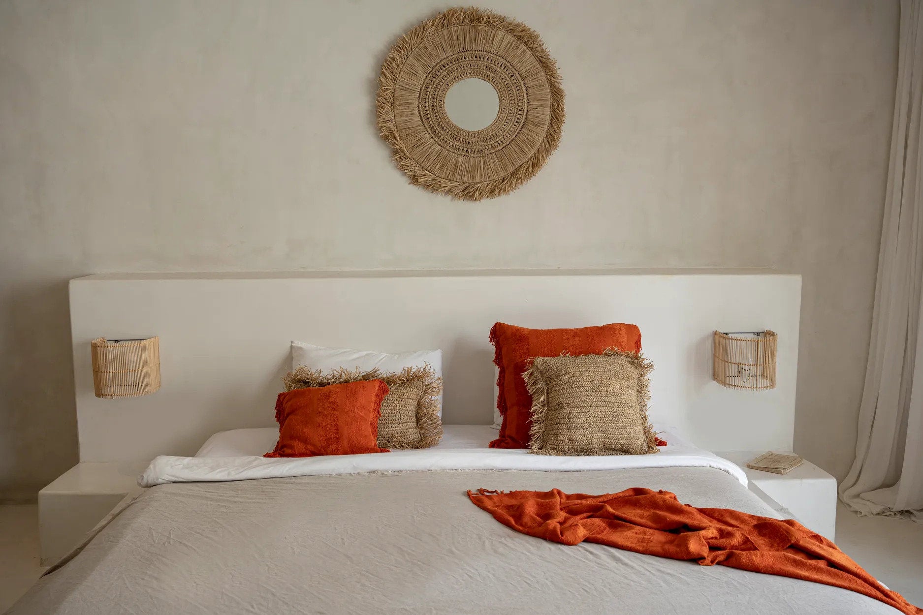 Add charm to your bed or sofa with the 40x40 raffia cushion cover.