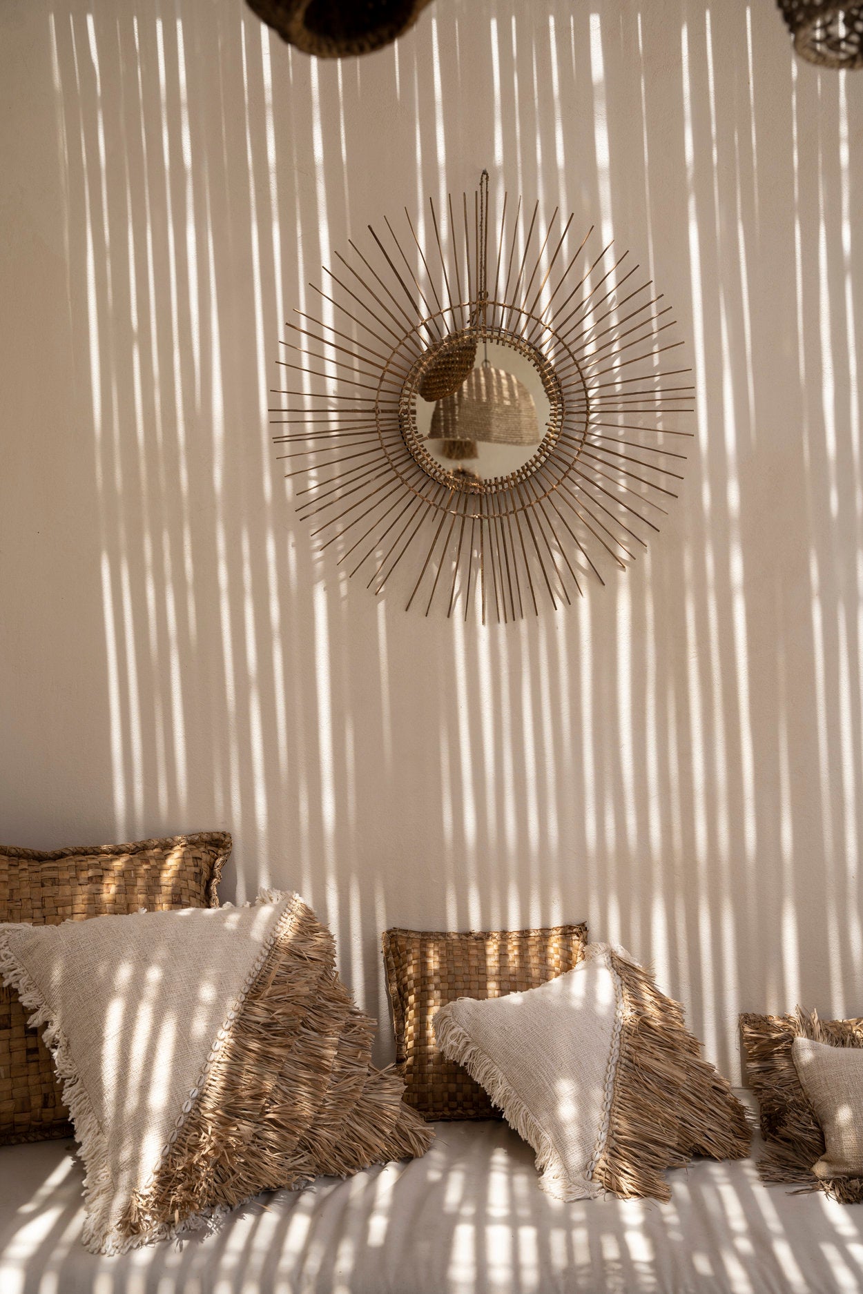 Handmade cotton cushion cover with raffia fringes for a coastal look