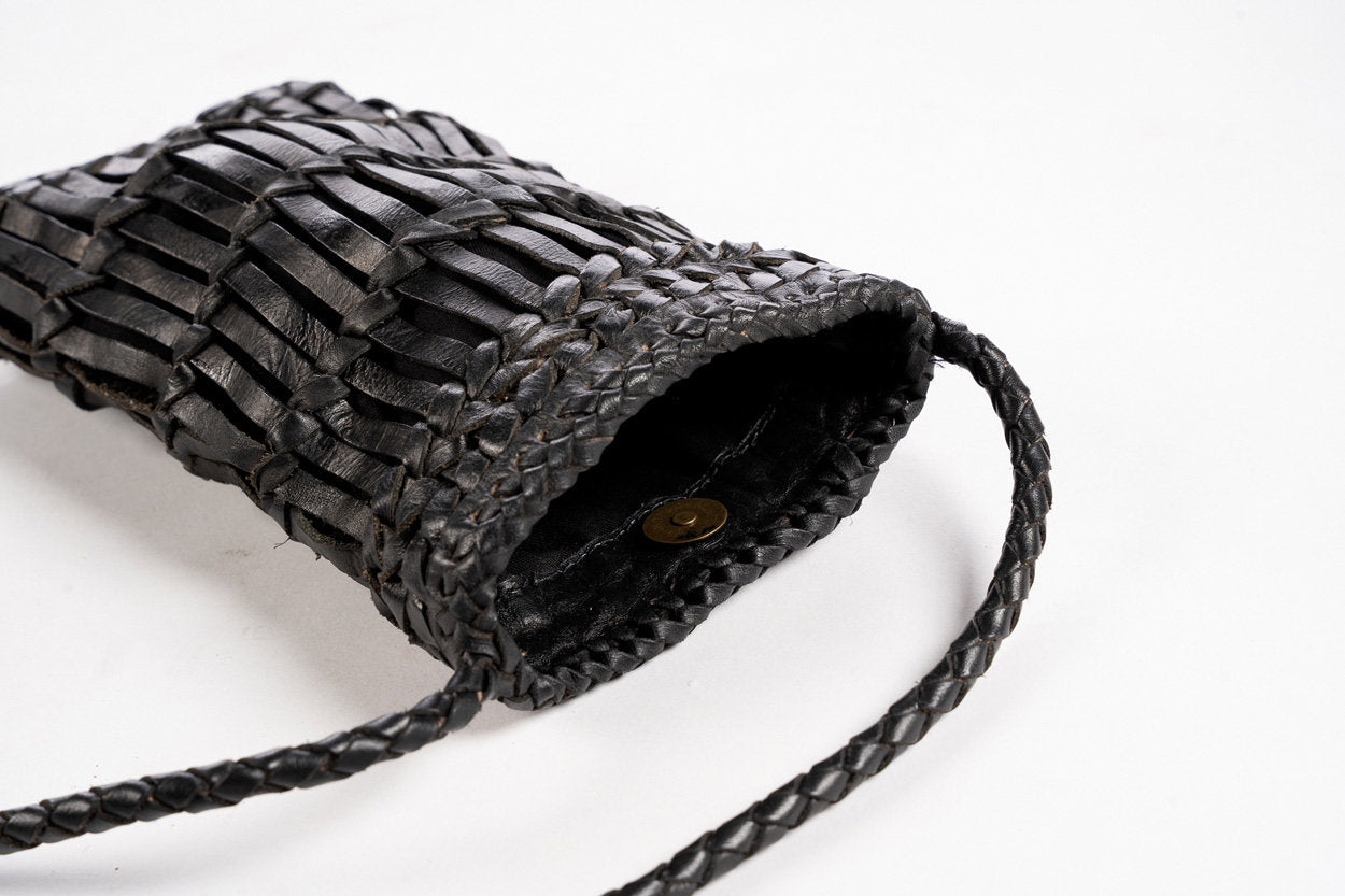 Handmade leather phone bag with minimalist style