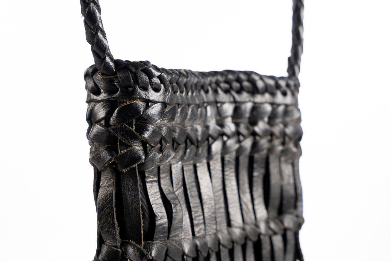 Handmade leather phone crossbody with refined finish