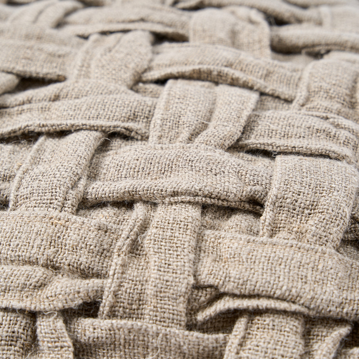 Handmade natural linen cushion cover, breathable and durable with a broad cross-weave texture.