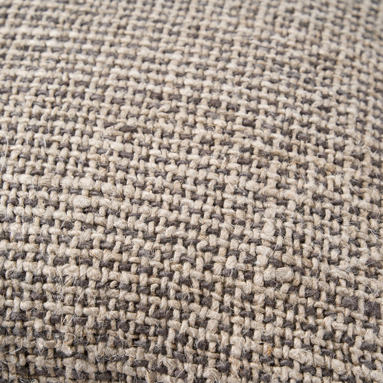 Square linen cushion cover in black, soft yet strong fabric that balances comfort and sophistication.