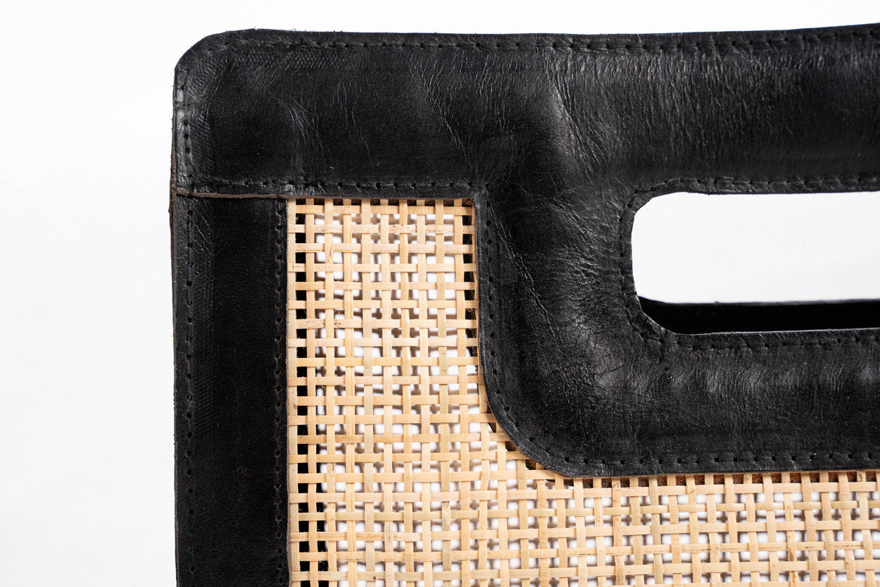 Minimalist black leather clutch with polished, durable finish