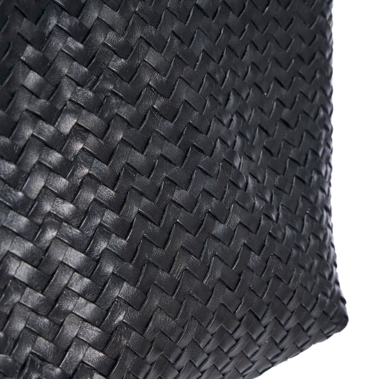 Durable artisan-made leather tote with sleek, structured design