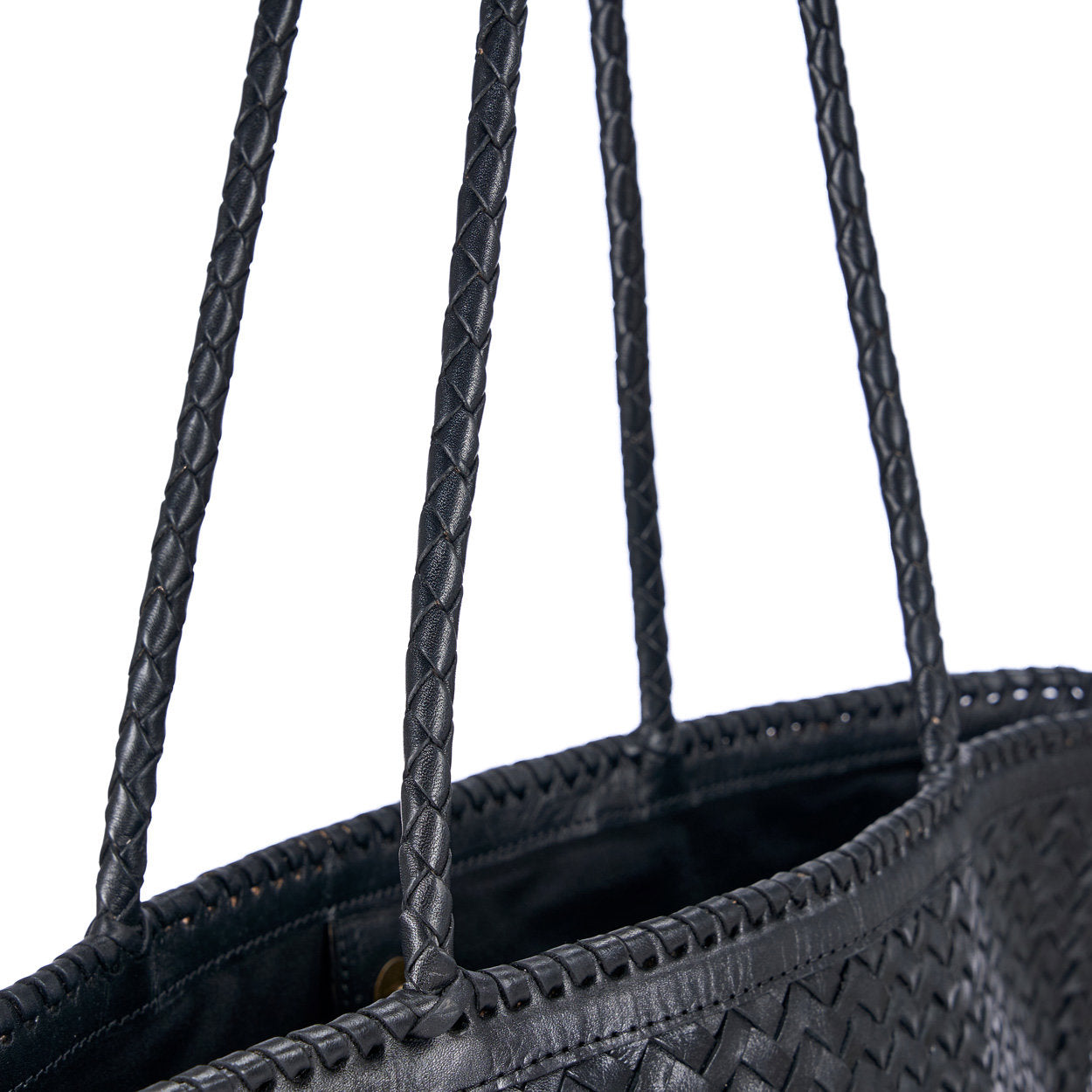 Artisan-crafted black leather tote with smooth, polished finish