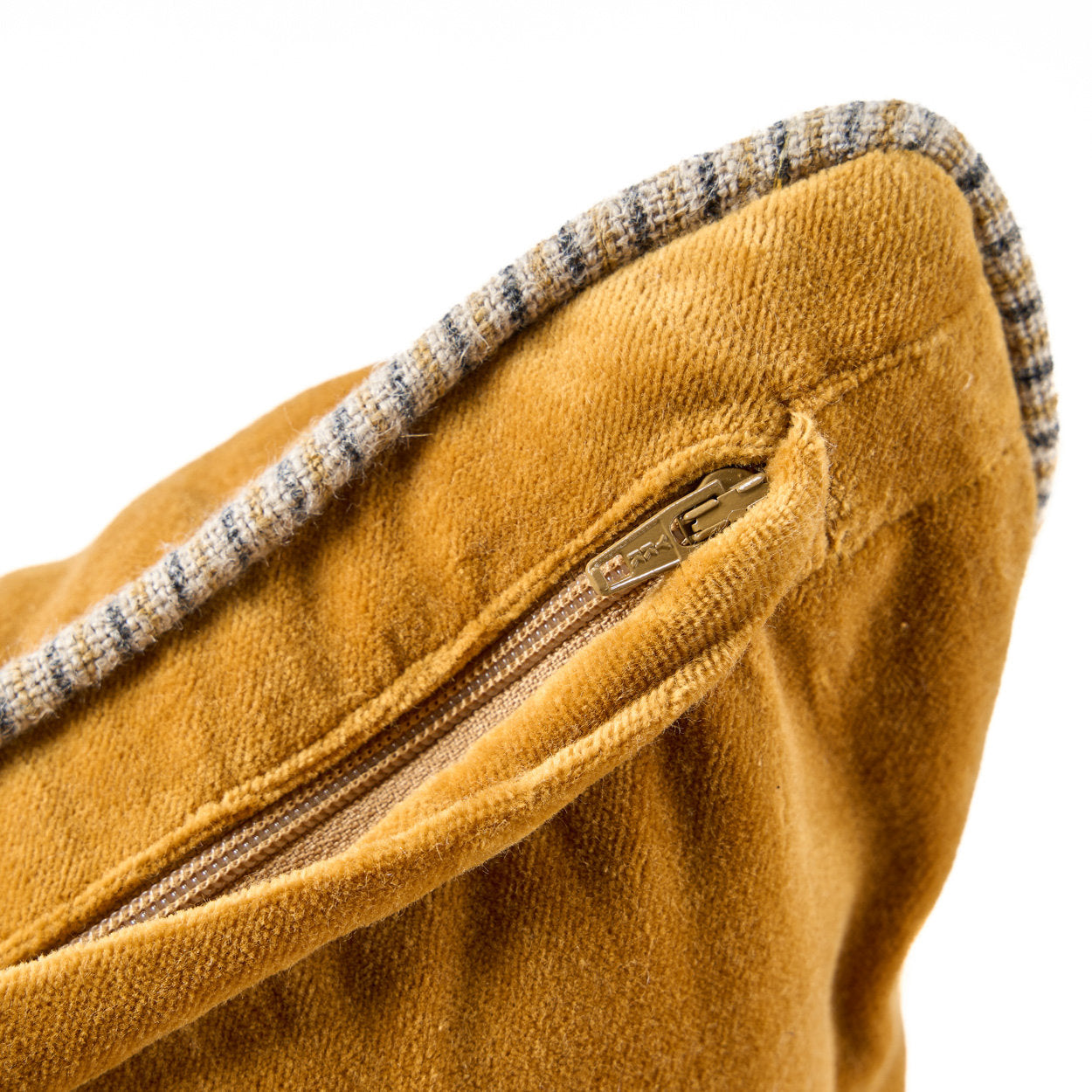 Vibrant mustard yellow velvet throw pillow for minimalist and tropical home décor