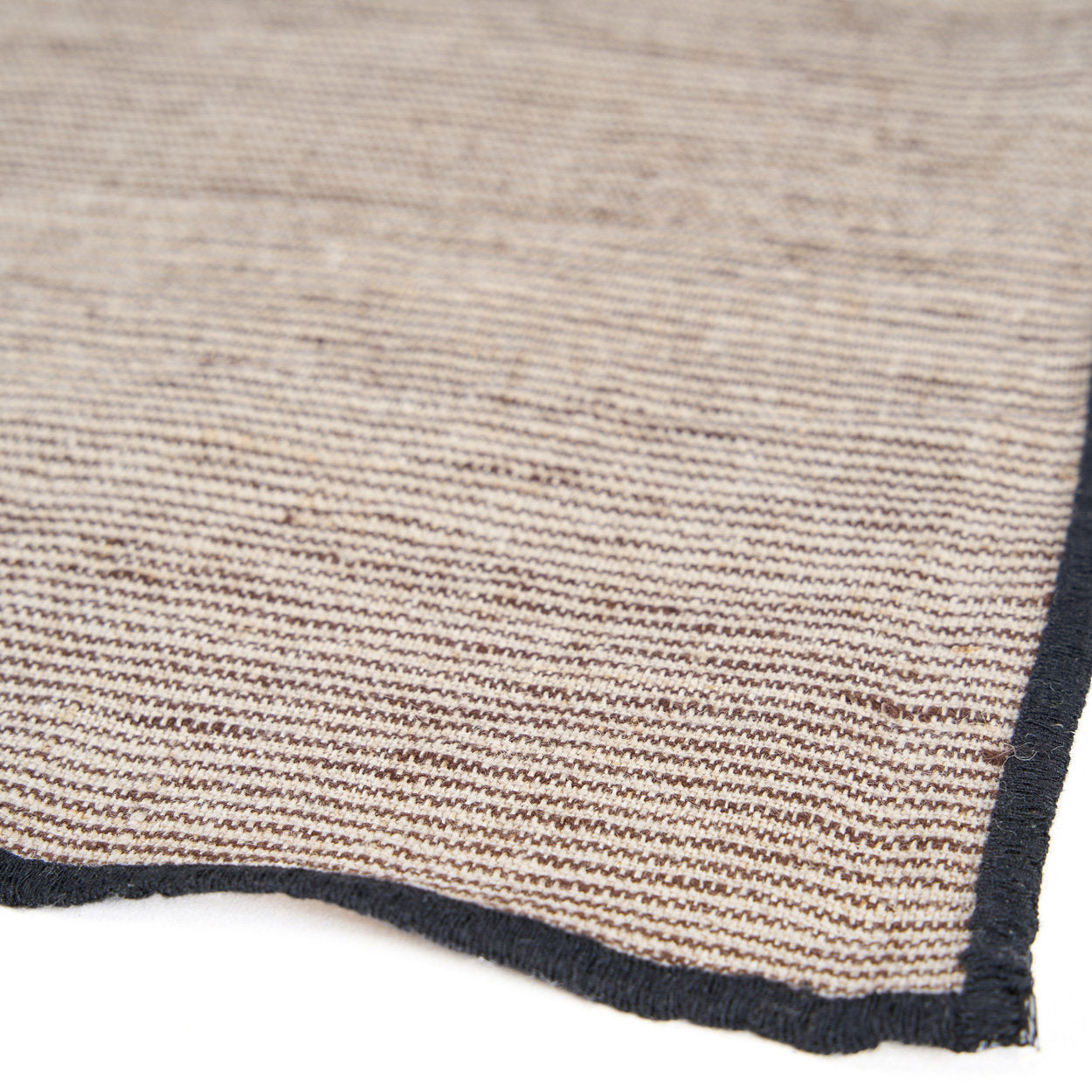 Artisan-crafted 45×45 cm linen napkin with subtle stripes, perfect for boho or minimalist table settings