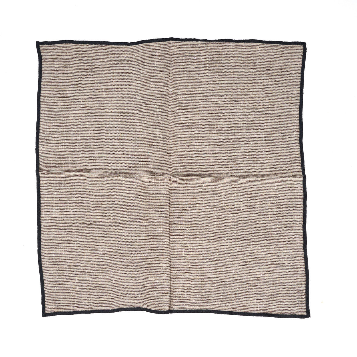 Folded 45x45 cm linen napkin styled on a wooden table, ideal for bohemian or minimal kitchens.