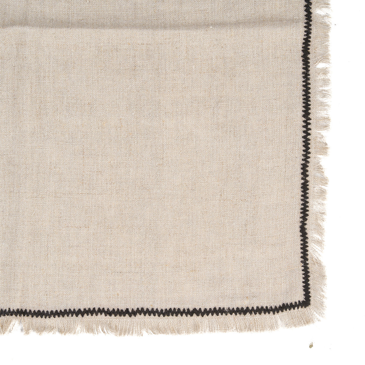 Artisan-crafted natural linen napkin with subtle black stripes, soft and absorbent for everyday use or dining occasions