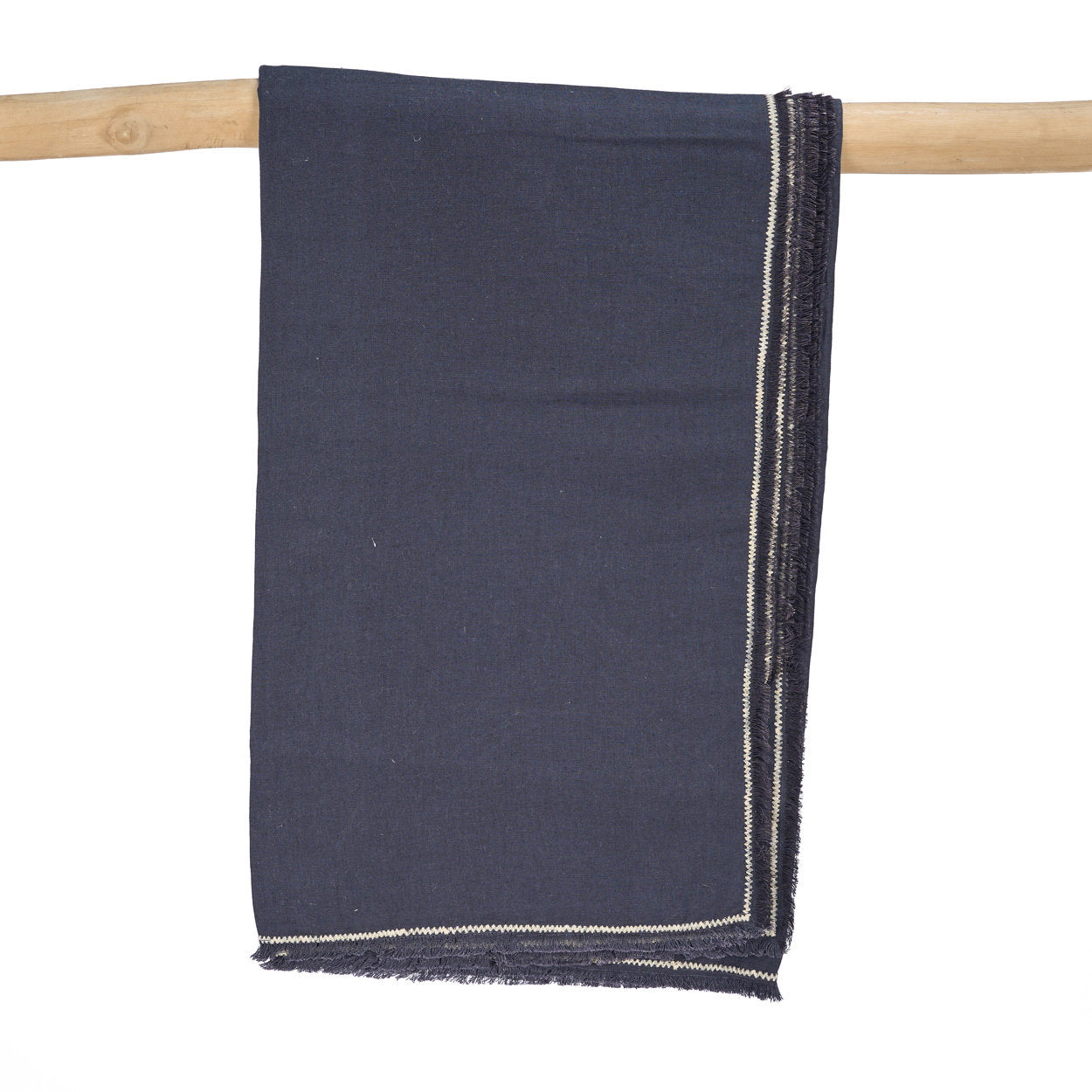 The Tuscany Tablecloth in black natural linen, 150x300 cm, perfect for adding elegance and warmth to your dining table.