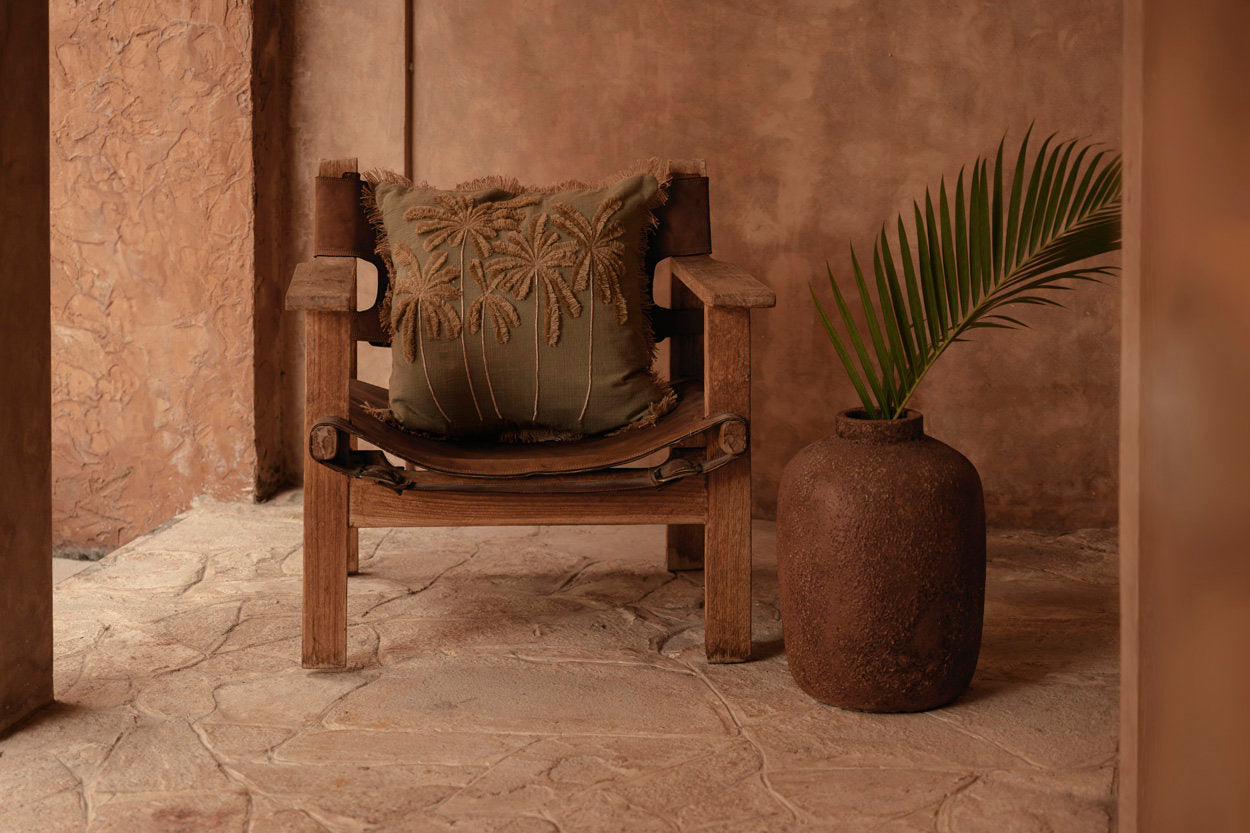 Handmade decorative cushion cover in forest green, ideal for boho or minimalist spaces