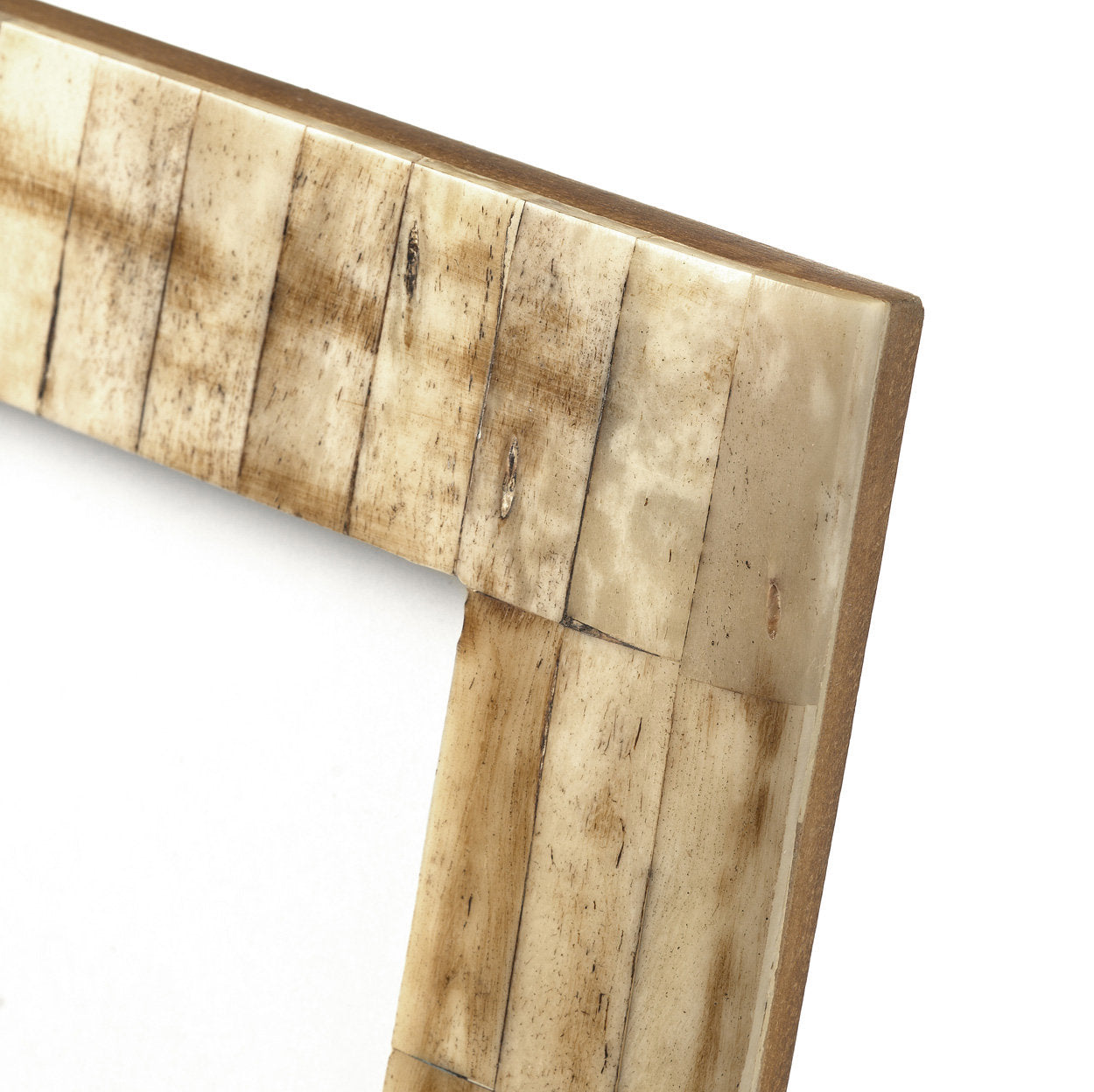 Handcrafted bone frame in antique style, perfect for cozy and natural interiors