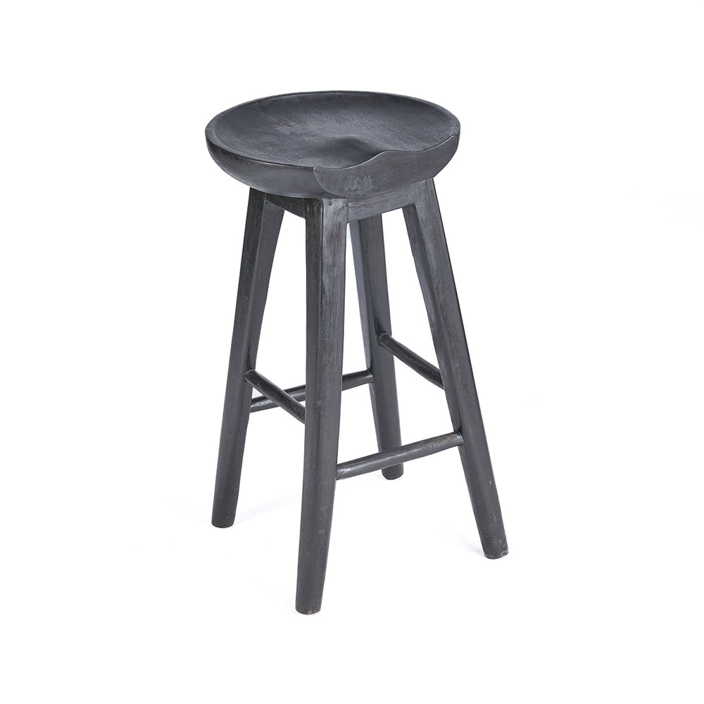 A sculptural black wooden bar stool crafted from solid mango wood for modern interiors.