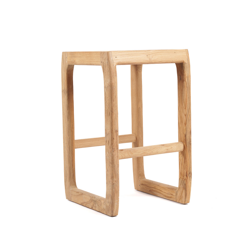 A backless bar stool with lower horizontal crossbars, hand-carved from reclaimed teak wood.