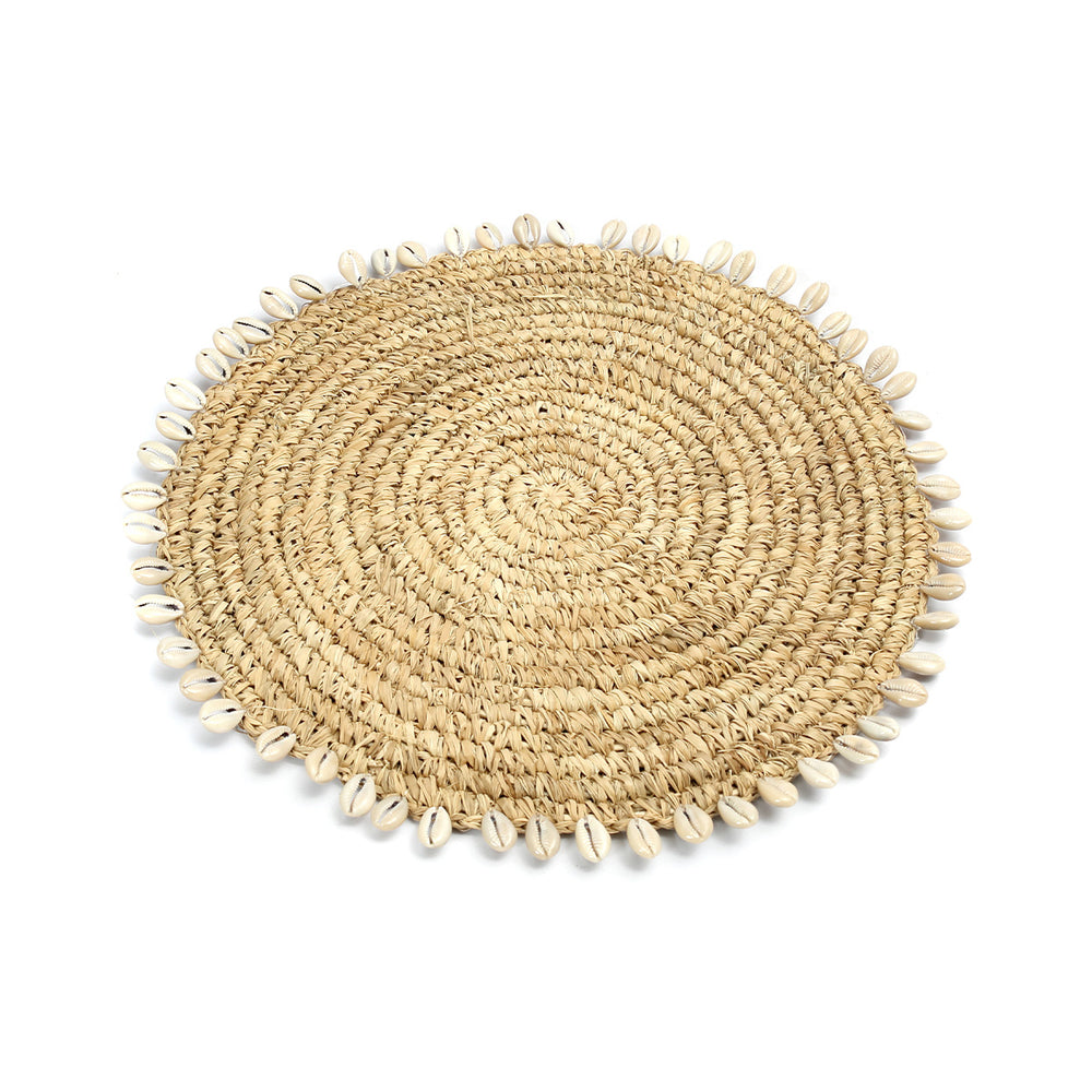 Raffia shell pan coaster, handmade for protecting surfaces while adding unique charm to kitchens and dining tables.