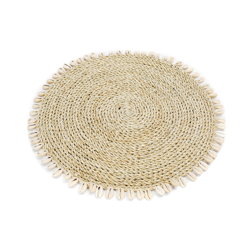 Handmade seagrass shell placemat, perfect for adding natural charm and protecting your dining table