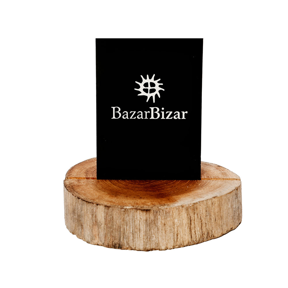 A place card holder crafted from raw teak wood, featuring a narrow slot and a beautifully unique natural wood grain.