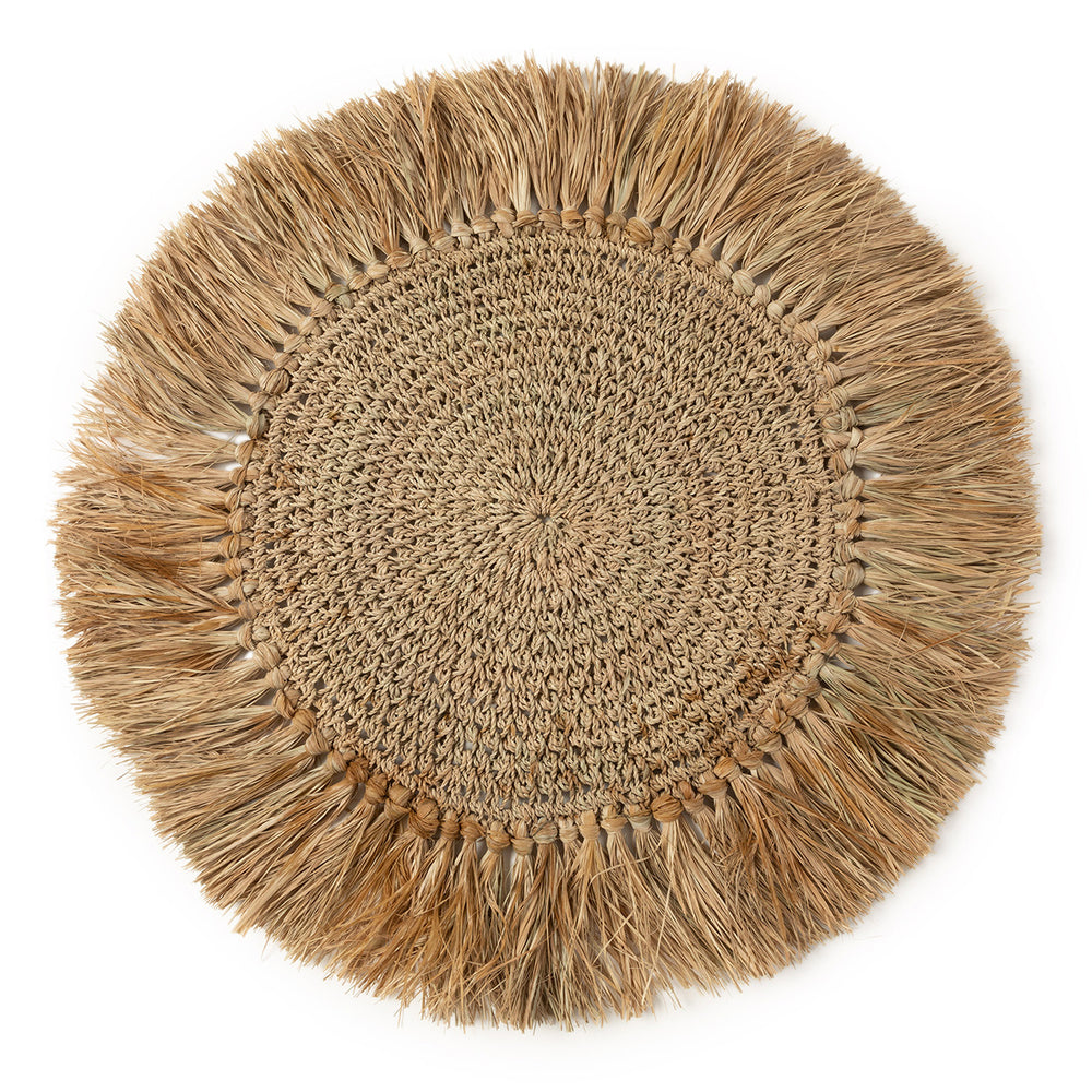 Round raffia placemat, handmade crochet design, perfect for adding rustic charm to your dining table.