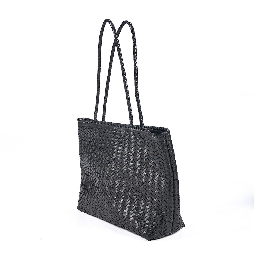 Black leather shopper bag handmade by artisans with traditional weaving.