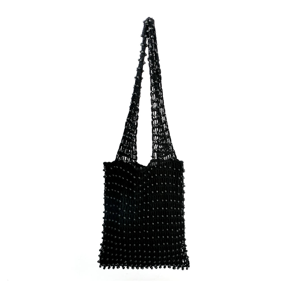 A lined crocheted market tote with a spacious yet slim profile, crafted from cotton and finished with wooden beads.