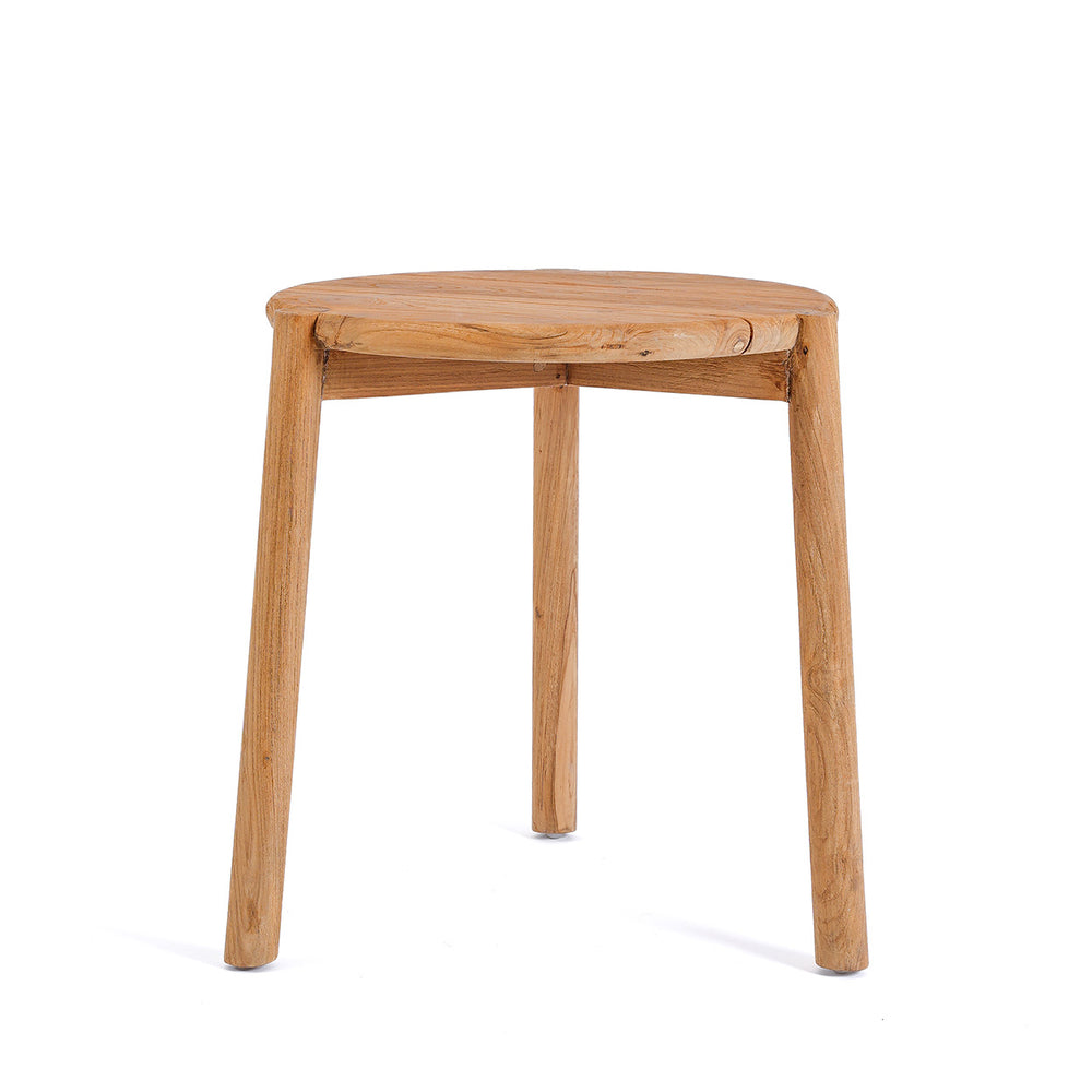 A slatted teak patio table with a three-legged base and warm honey-toned wood.
