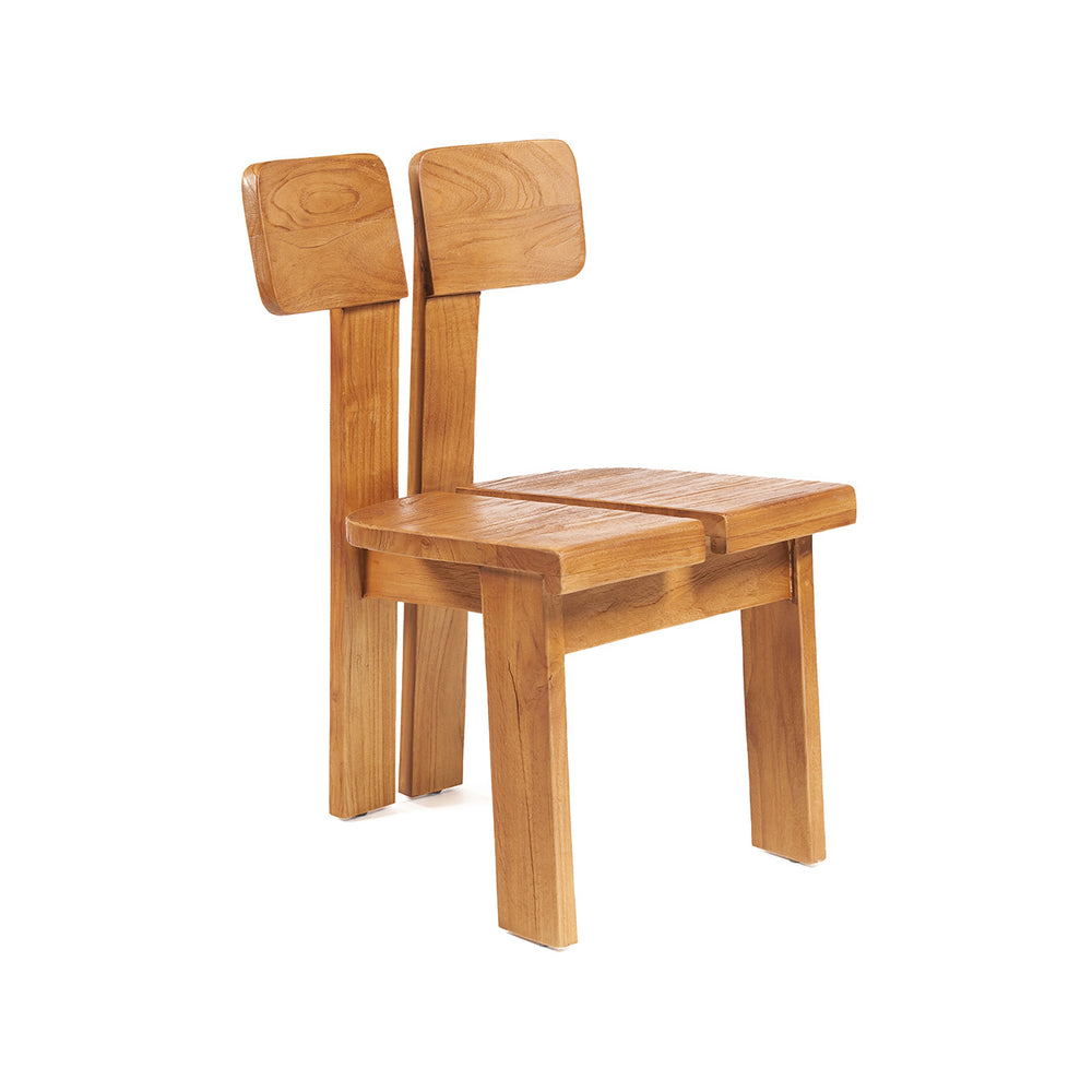 A minimalist timber dining chair in a natural honey tone, finished with a modern split-back and split-seat design against a white background.