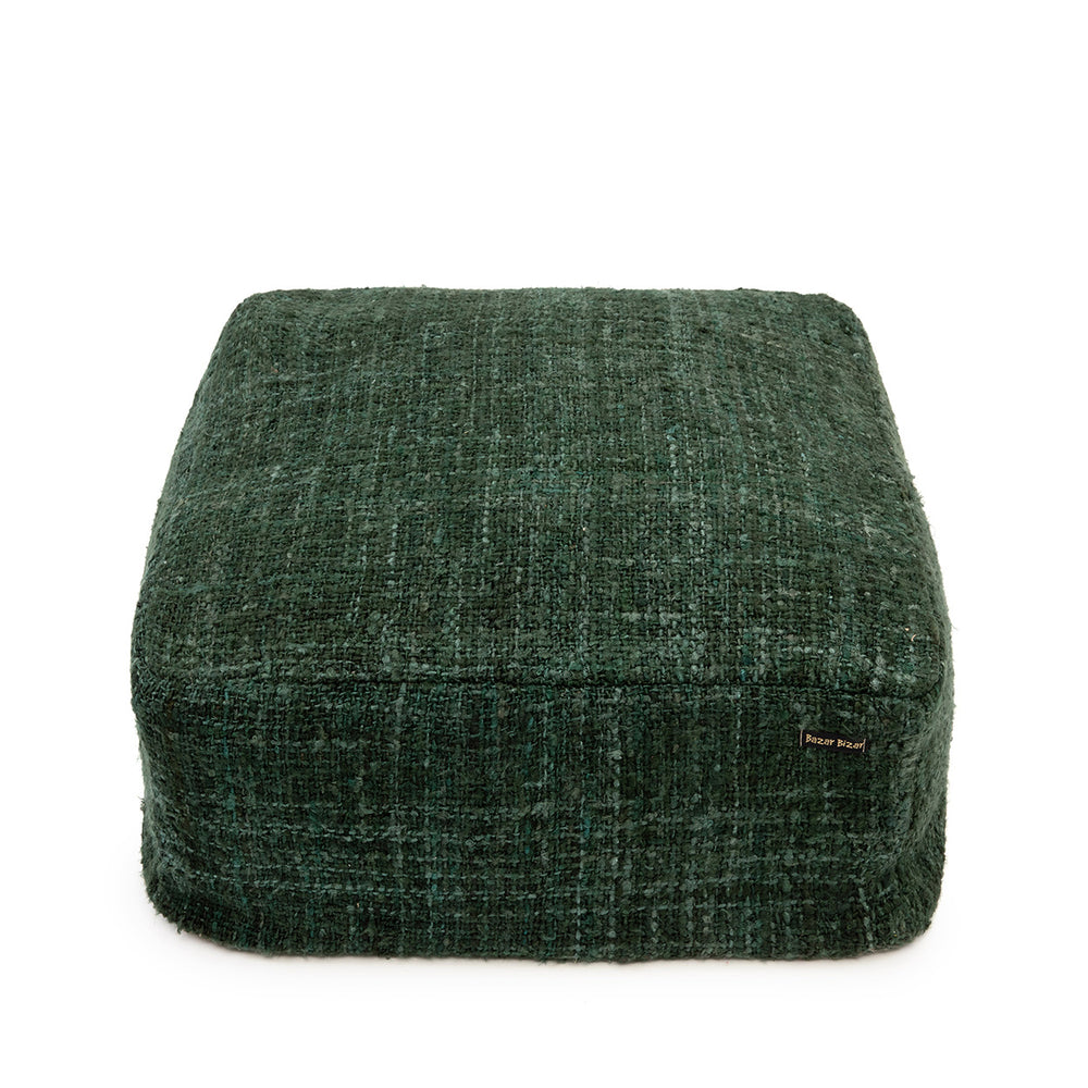 A green square cotton pouffe in a compact, boxy design.