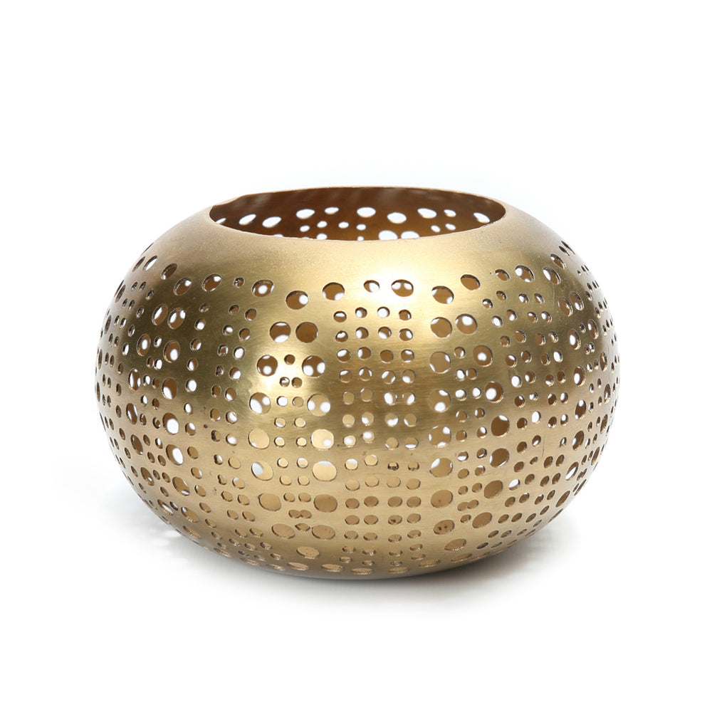 Modern gold candle holder in solid brass for elegant home decor.