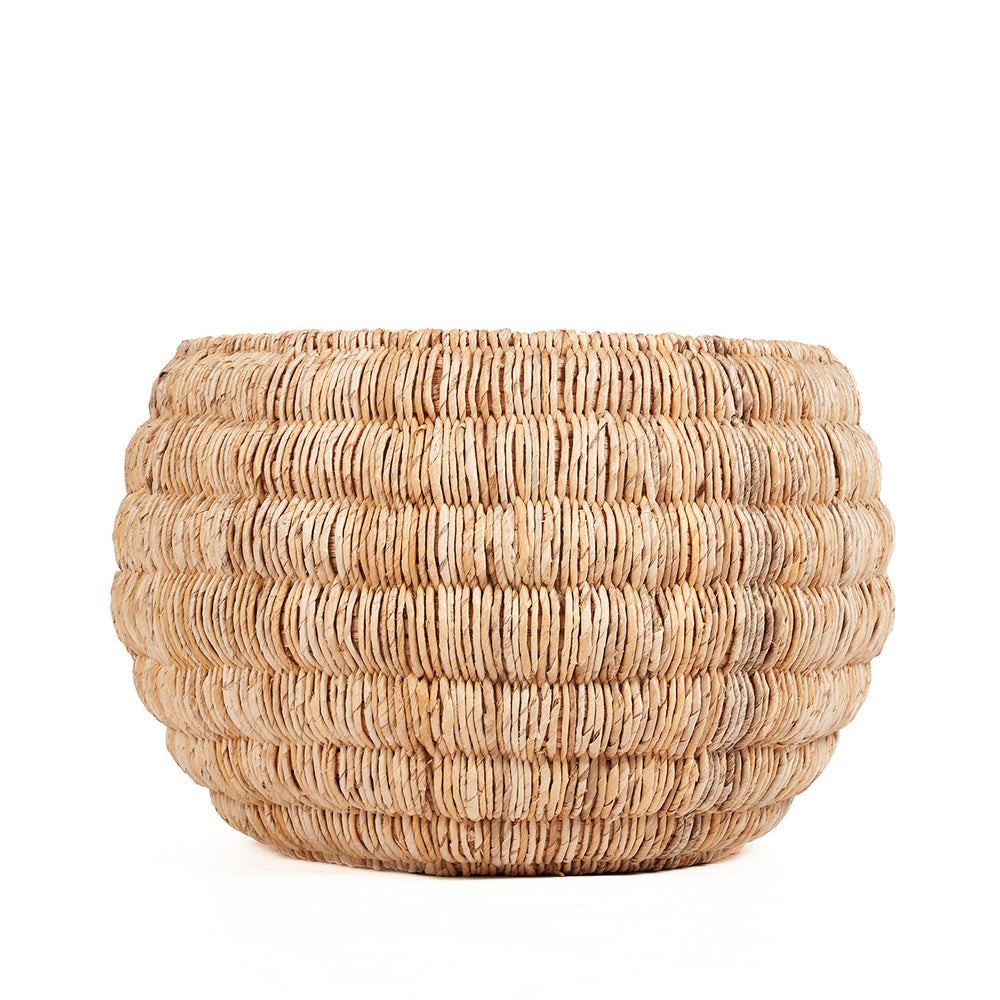 A ribbed woven floor basket in a natural colour and generous size.