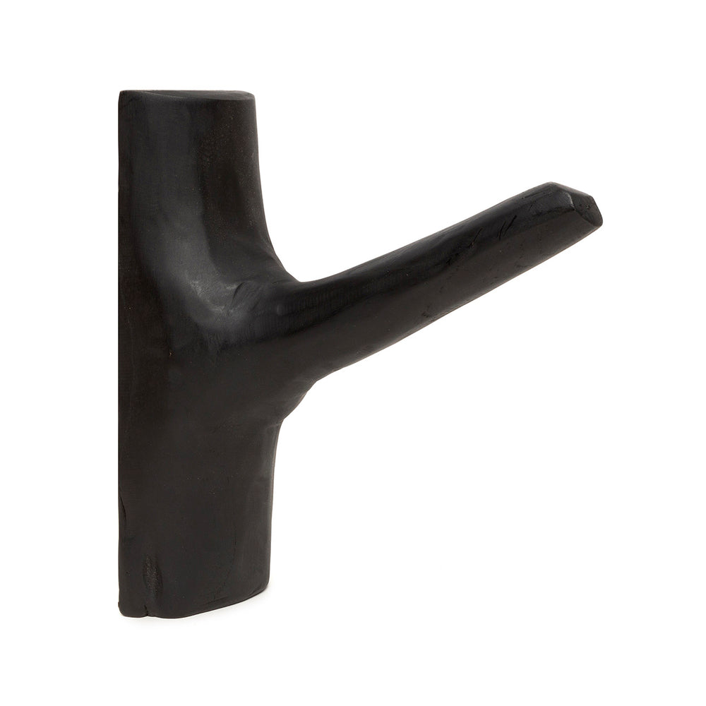 Solid wood coat hook in black teak finish, ideal for modern minimalist interiors.