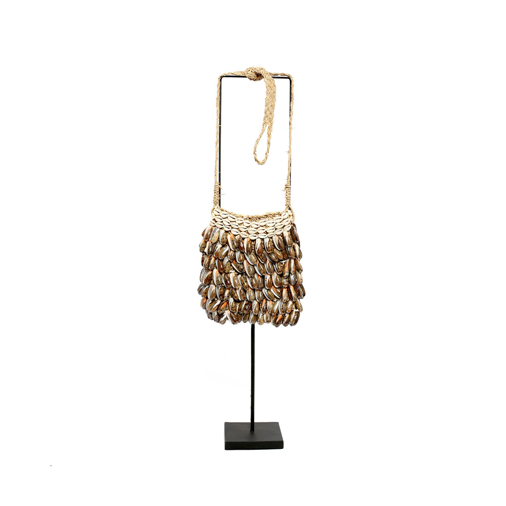Natural brown shell purse on stand decor, handmade in Bali.