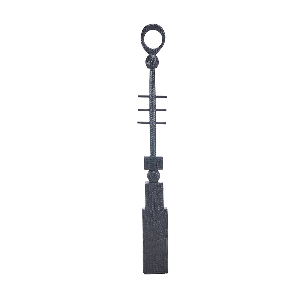 The Totema Pillar stands as a wooden pillar decor crafted from black mango wood, designed as a sculptural statement.