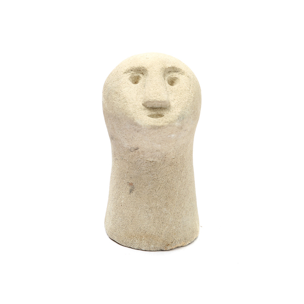 A stone statue decor in natural tone with artistic portrait, handmade in Indonesia from sandstone.