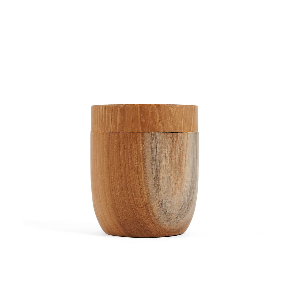 A medium wooden storage jar with lid.