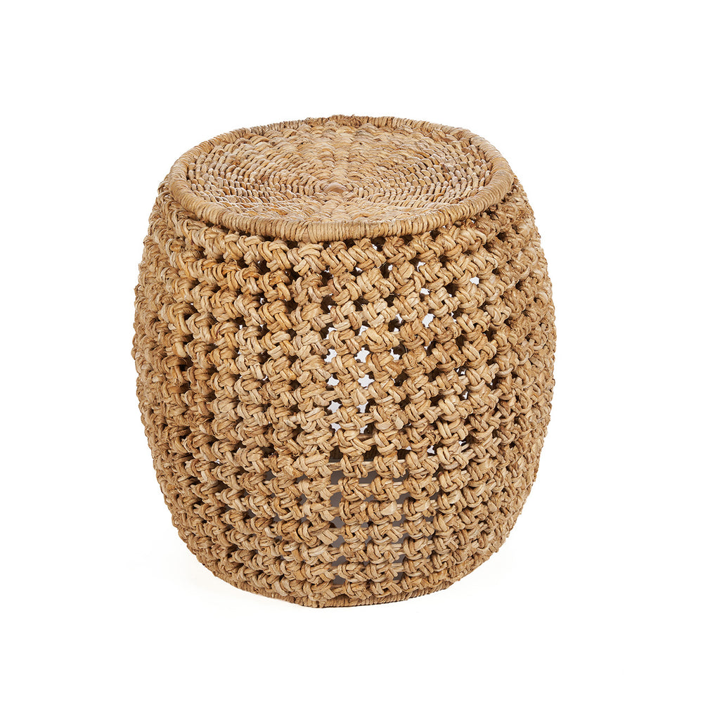 A banana leaf wicker stool with an open-work lattice weave and iron frame, showcasing a toasted wheat-like hue.