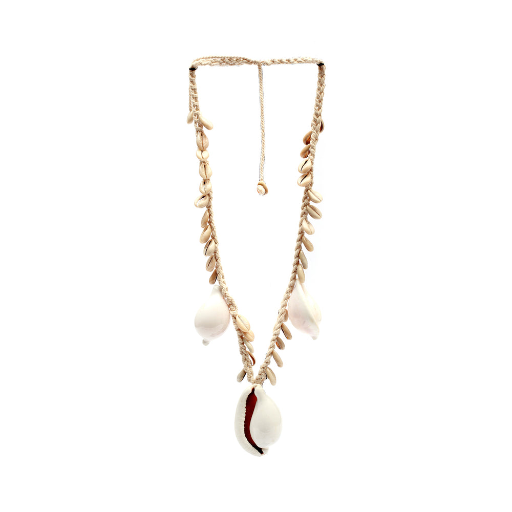 White cowrie necklace with cream-toned cotton.