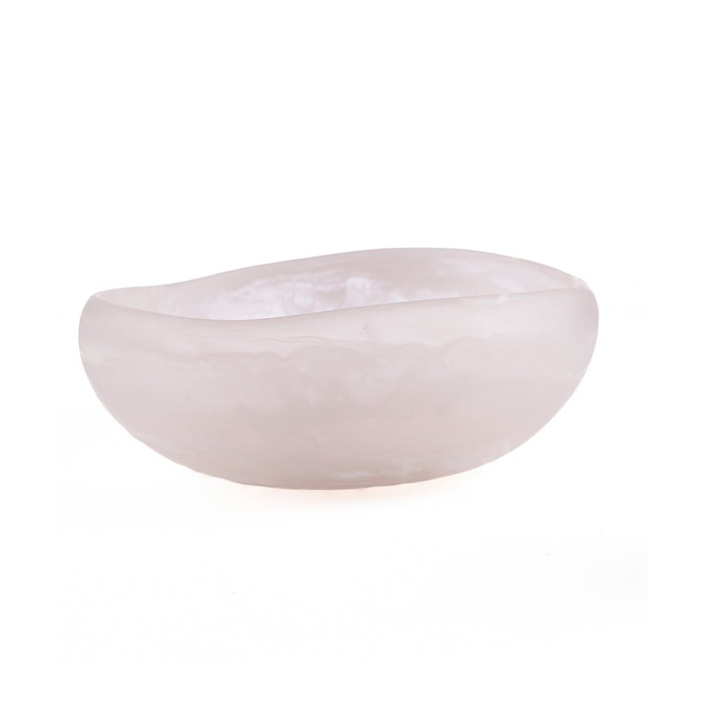 A large resin decorative bowl with a free-flowing rim, coated in soft blush pink and infused with milky white swirls.