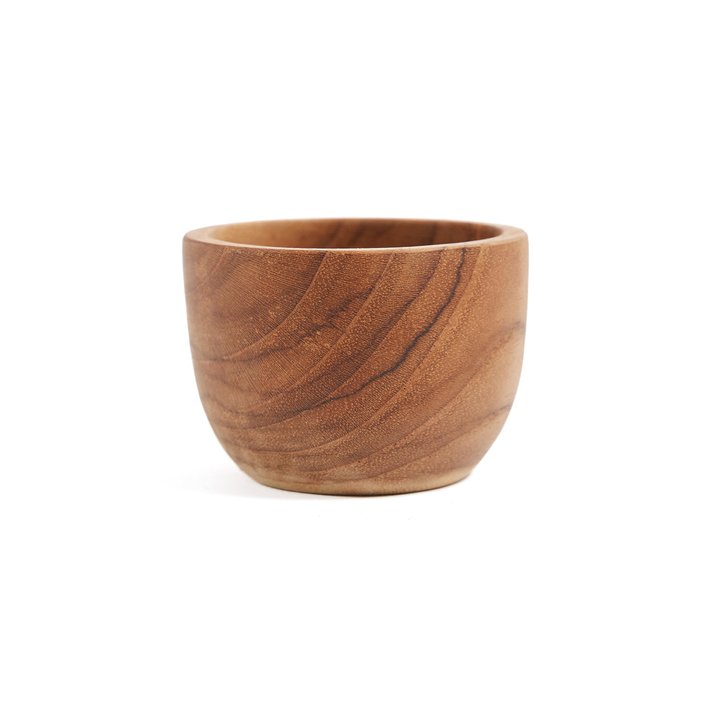 A teak wood egg cup in a compact, rounded cylindrical silhouette.