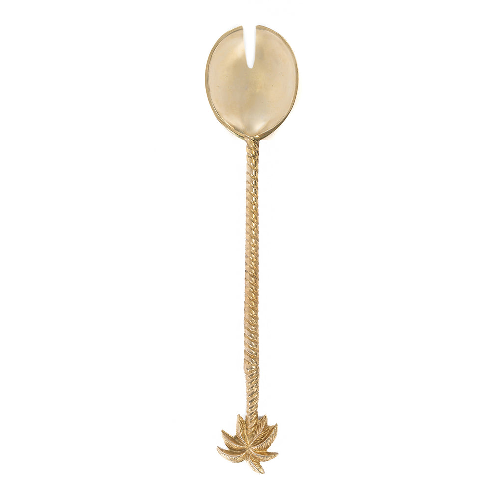 A brass salad fork with a golden touch radiates elegance and sophistication.