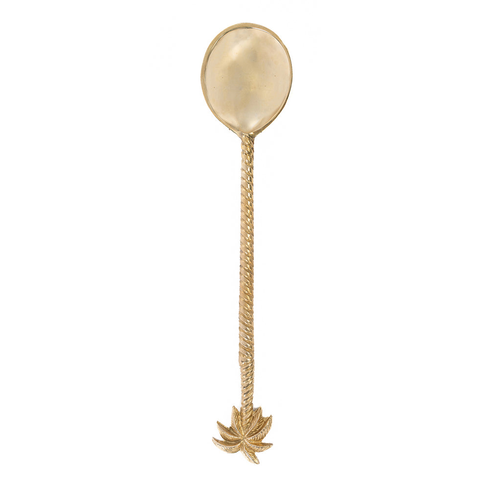 A brass salad spoon in sophisticated golden hue and palm tree accent, enriched with twisted handle.