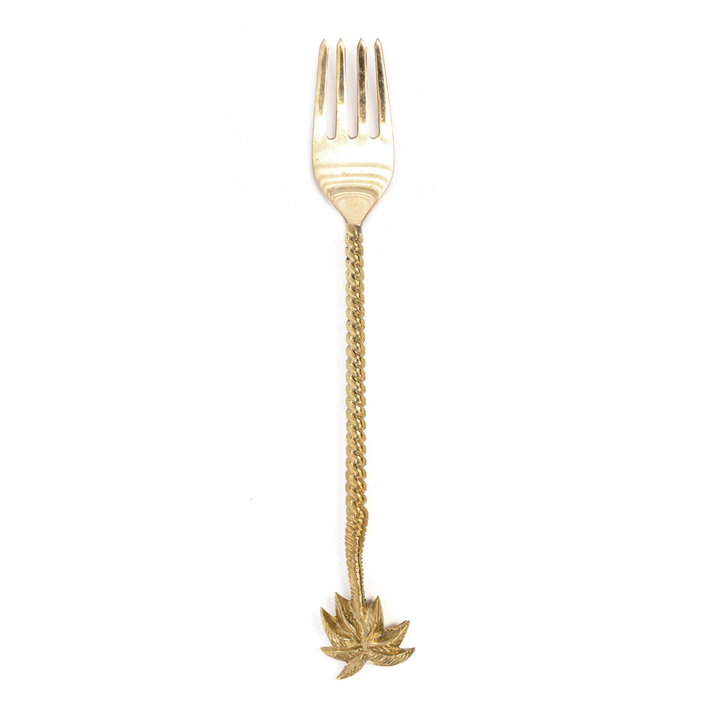 A brass palm tree fork with golden color, giving sophisticated and shiny touch for delighted dining moment.