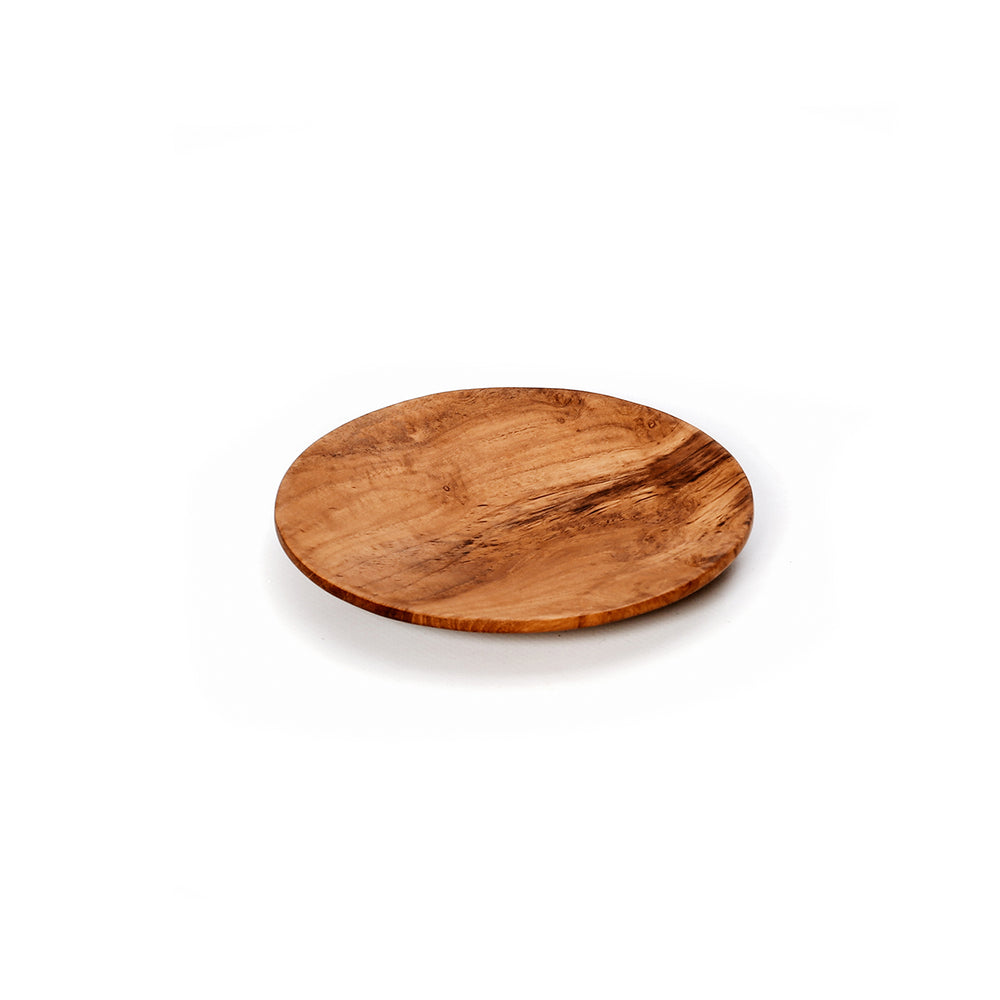 A mini teak wood plate with a natural swirls finish and round shape.