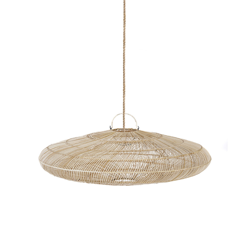 A large pendant light shade in a circular form, crafted from rattan with a natural hue.