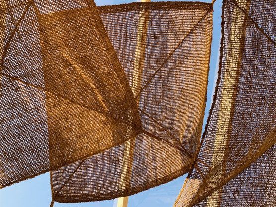 Rustic coconut fiber fencing for boho or tropical-inspired backyards