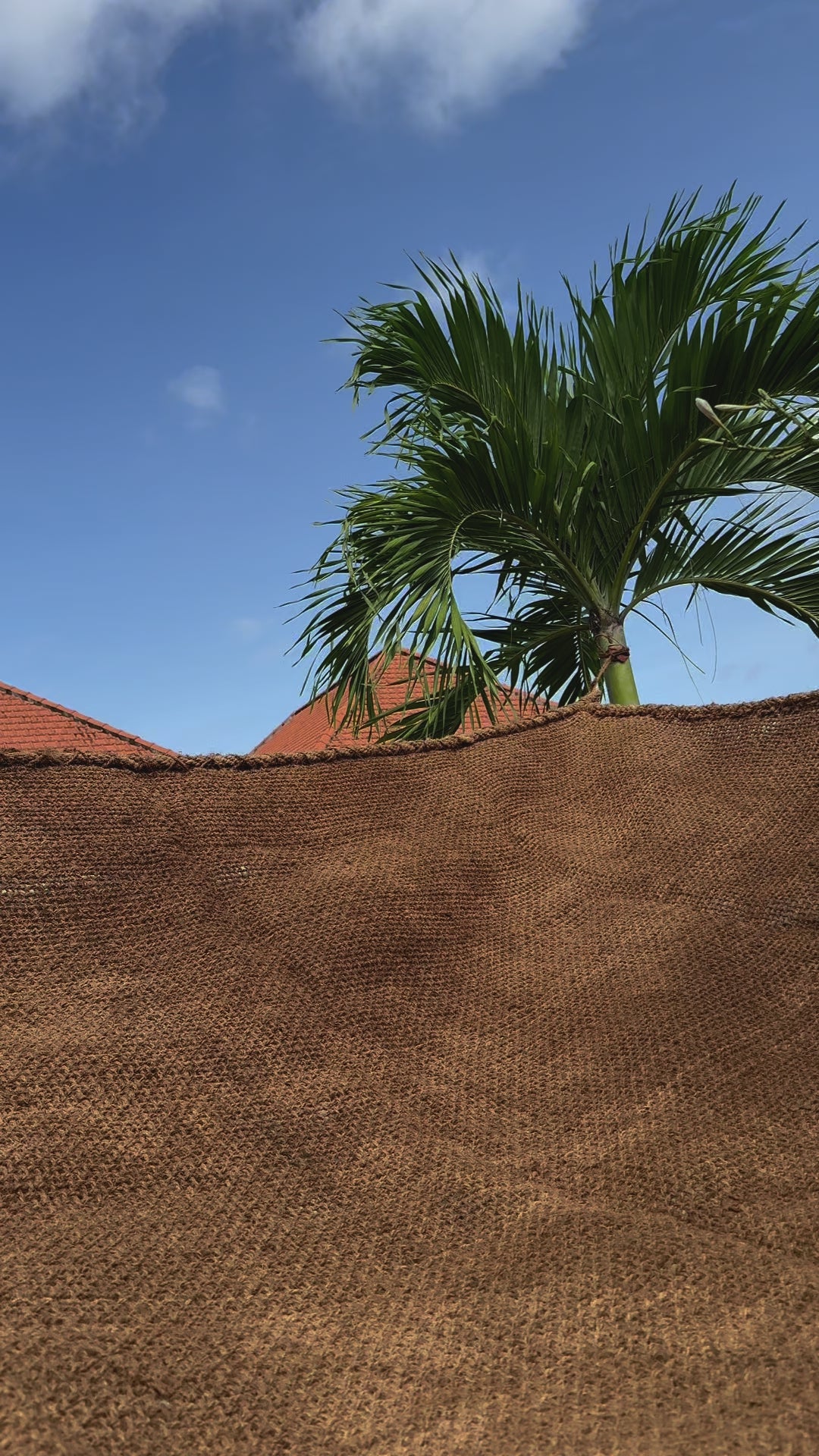 Durable and moisture-resistant garden fence crafted from coconut fiber