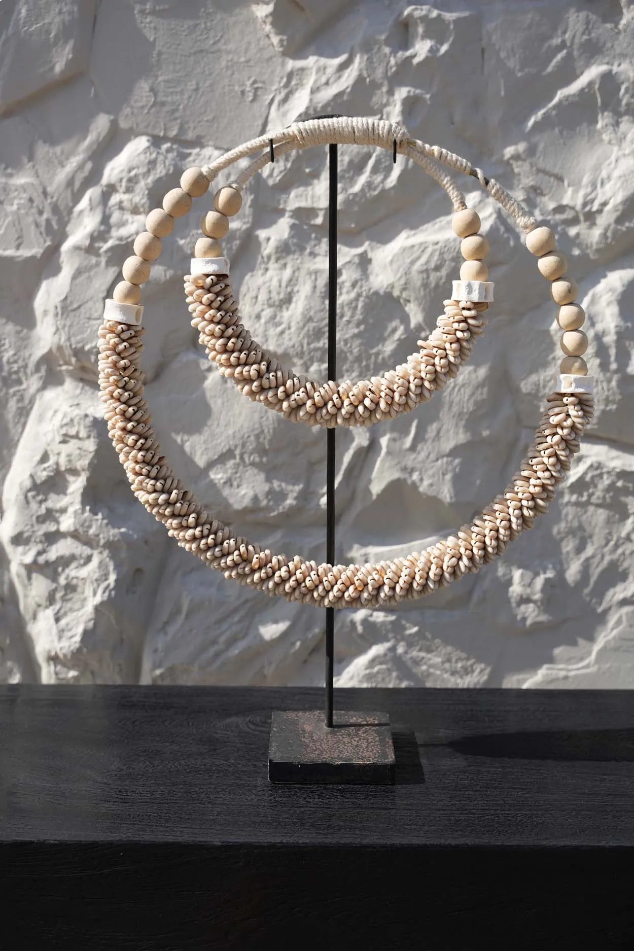 the-double-shell-necklace-on-stand-natural