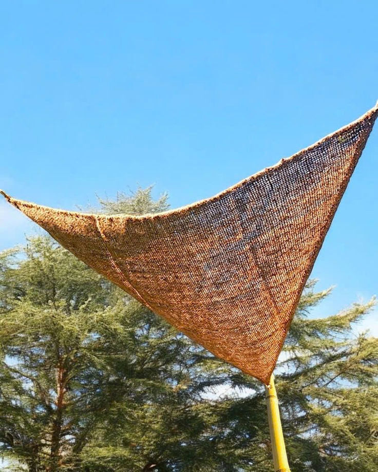 Handcrafted triangle outdoor sun shade for patios and gardens