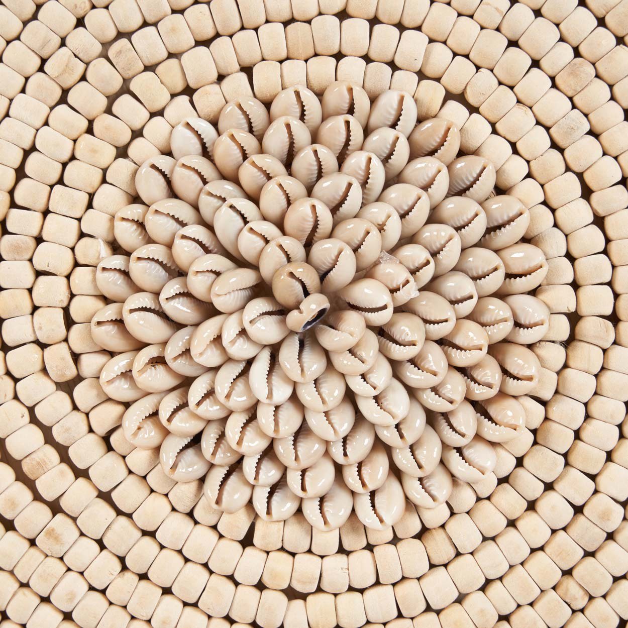 Artisan-made shell accent on stand – timeless addition to beach-inspired spaces