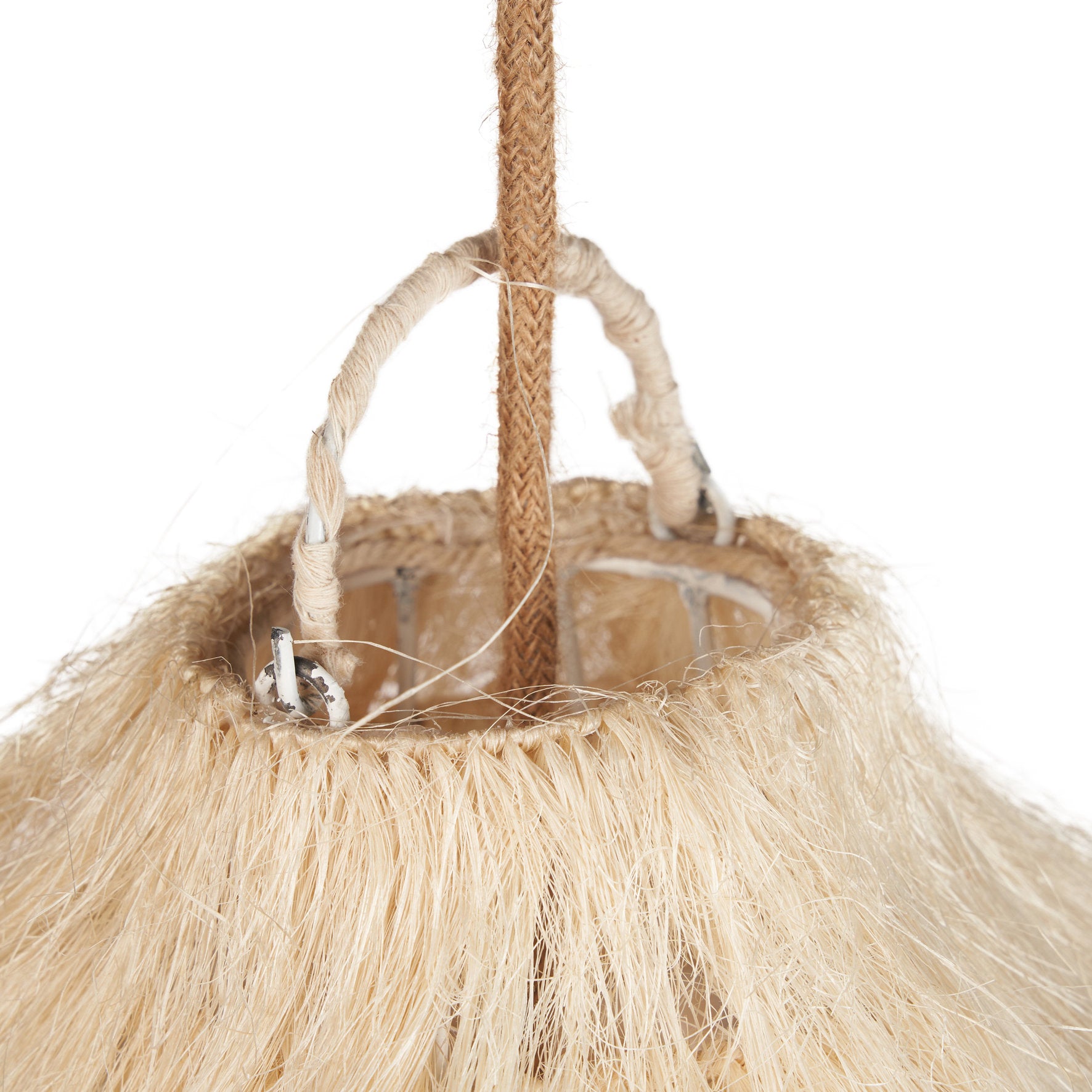 Natural fiber pendant light with organic curves, designed to cast soft patterns across wide spaces