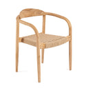 A teak armchair for the patio with tapered legs, a rounded barrel-style form, and a textural seat weave.